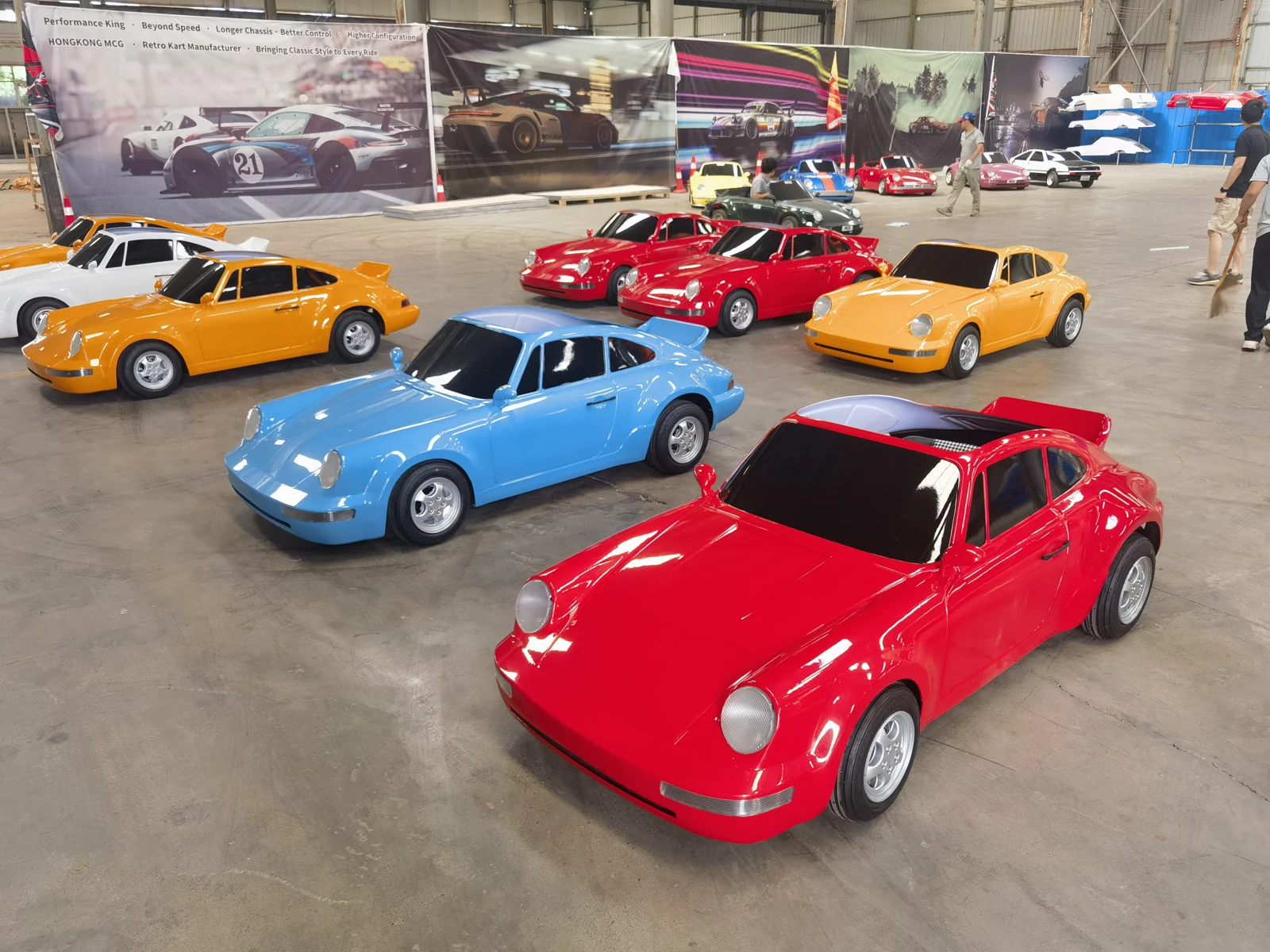 Adult drift go karts in red and blue with classic sports-car styling