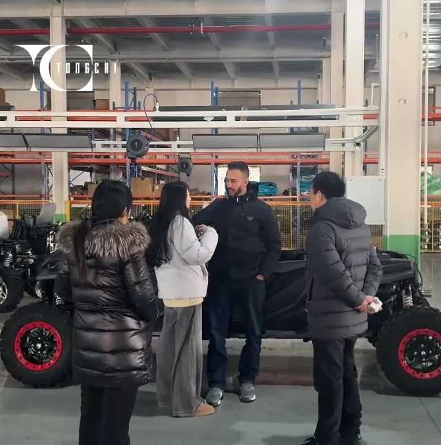 Customer team touring the golf cart factory and production area