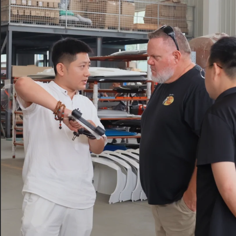 Factory team explaining controls, features and configuration choices